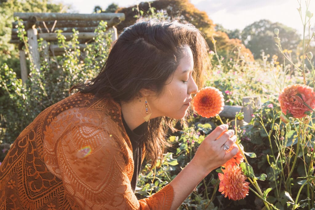 Lady Smelling flower