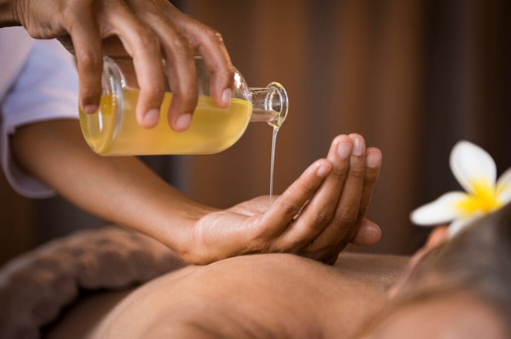 pouring massage oil edited
